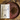 Alaska Wild Chaga package on a wooden surface with a rustic plate