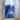 Bottle of Hammers Family Birch Birch Sap Drink with a blue label on a blurred background