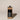 Bottle of Wild Alaskan Chaga Mushroom Extract in a cardboard box on a beige background