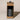 Bottle of Wild Chaga Extract from Alaskan mushrooms in a cardboard box on a beige background
