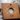 Handcrafted birch sap soap in a brown cardboard box with leaf designs.