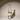 Bottle of 'Lemon Birch Brew' on a neutral background. This is an Alaska fermented birch sap beverage with natural lemon added.